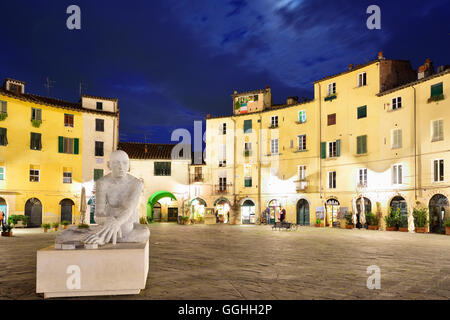 Piazza Anfiteatro Romano at night, Lucca, Tuscany, Italy Stock Photo