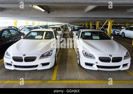 New cars in a parking garage before shipping in Bremerhaven, Germany Stock Photo