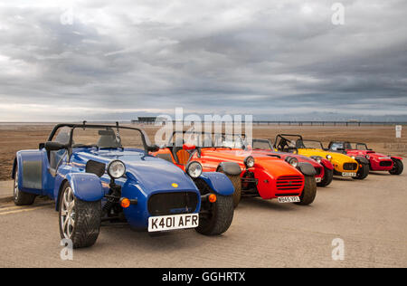 2007 Westfield Se1, several two-seater, hand built sports car, open top sportscars, as classic car club meet on Southport seaside beach on a slipway with the pier in the background, Merseyside, UK Stock Photo