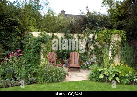 Patio- secluded by wall of climbers   MIW251694 Stock Photo