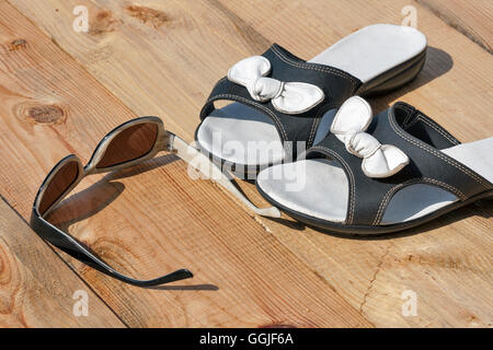 beach accessories on wooden board. summer vacation concept Stock Photo