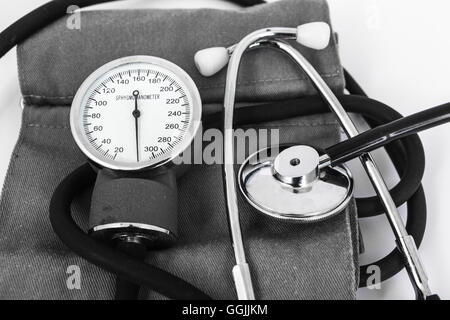 analog sphygmomanometer with white background Stock Photo