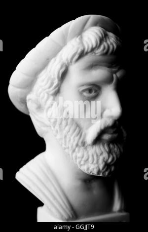 Pythagoras of Samos, was an important Greek philosopher, mathematician, geometer and music theorist.  White marble bust. Stock Photo