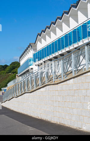 Beach huts between Branksome Dene and Branksome Chine, Poole, Dorset, UK in July Stock Photo