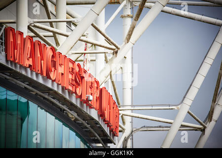 Manchester united sign old trafford   Sir Matt Busby Way sign neon on stadium design close up letters  outside Old Trafford copy