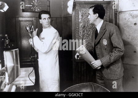 BRAZIL / Brazil GB 1984 / Terry Gilliam Jack Lint (MICHAEL PALIN), Sam Lowry (JONATHAN PRYCE) box Regie: Terry Gilliam aka. Brazil Stock Photo