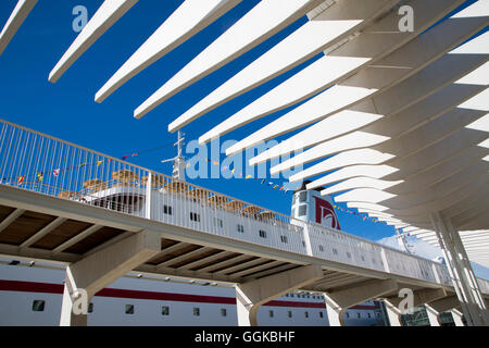 Modern architecture of Malaga Cruise Terminal with cruise ship MS Deutschland (Reederei Peter Deilmann), Malaga, Andalusia, Spai Stock Photo