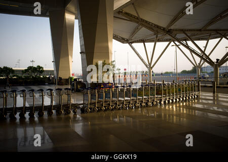 Luggage carts line  outside the New Delhi Indira Gandhi International Airport (India).© Jordi Boixareu Stock Photo
