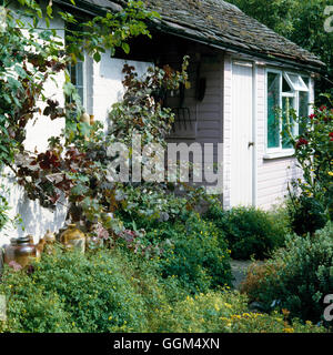 Screening - Tool storage area in covered passage   SNG027933 Stock Photo