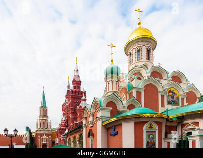 View of Nikolskaya Tower, State Historical Museum and Kazan Cathedral on sunny day in Moscow, Russia Stock Photo