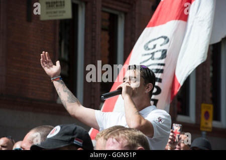 Nottingham, UK, Saturday 6th August, 2016. Members of the English Defence League (EDL) hold a large demonstration in Nottingham City Centre, England.  The rally began at 13:30 close to Derry Mount, the location where Charles I raised his Royal Standard to signify the beginning of the English Civil War in 1642.  Protestors were then escorted by police through the city centre and onto to speakers corner, where speeches were made, protesting the rise of “radical Islam and left wing racism towards the English'. Credit:  Byron Kirk/Alamy Live News Stock Photo