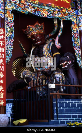 A ferocious god at the entrance to the Huatang Temple near Kunming in ...