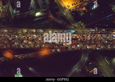 Aerial view of urban highway lit up at night Stock Photo