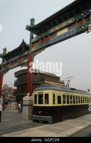 A restored streetcar on Qianmen Street at Zhengyang Gate. Beijing – China. Stock Photo