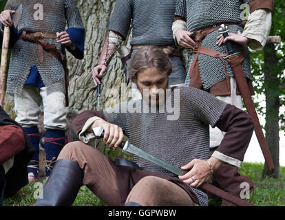 Members of the Folklore and Ancient Fight group Vilkaci dressed as ancient warriors in Seja Vidzeme Latvia Stock Photo