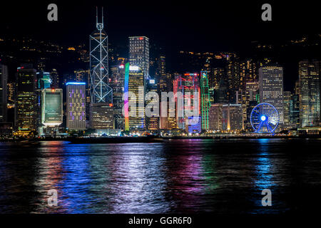Hong Kong,Hong Kong SAR,China.25th July 2016.Hong Kong skyline lights reflect in the water.© Jayne Russell/Alamy Stock Image