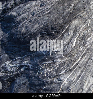Beautiful colors and shapes are found in boulders on the beach Stock Photo