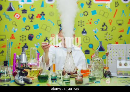 Asian boy  doing chemical experiments in the laboratory Stock Photo