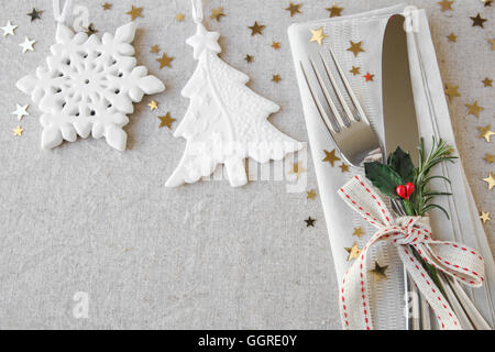 Christmas table place setting, holidays copy space background Stock Photo