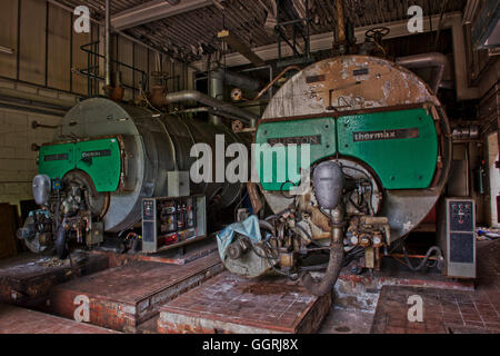 Inside the boiler room within the closed St Clements Hospital in London's East End before the major redevelopment. Stock Photo