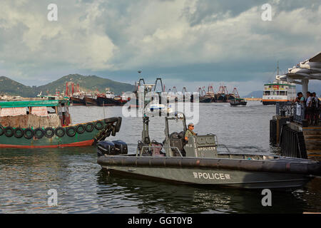 A Hong Kong Police Launch By The Public Pier On Cheung Chau Island, Hong Kong. Stock Photo