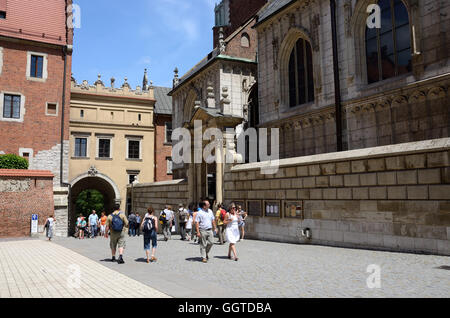 KRAKOW, POLAND - JUNE 16: Unidentified tourists visiting Gothic Wawel Royal Castle in Krakow, Poland on June, 16, 2013.Krakow is Stock Photo