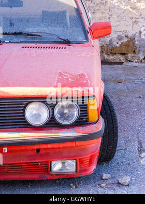 Photo of an old abandoned red car Stock Photo