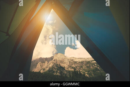 Mountains Landscape view from tent camping entrance Travel Lifestyle concept Summer vacations outdoor Stock Photo