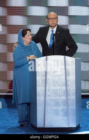Khizr Khan and his wife discuss their son, Capt. Humayun S. M. Khan during the final day of the Democratic National Convention at the Wells Fargo Center July 28, 2016 in Philadelphia, Pennsylvania. Khan a U.S. Army officer was one of 14 American Muslims who died serving the United States in the ten years after the September 11, 2001 terrorist attacks. Stock Photo