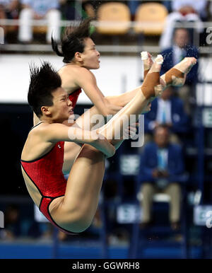 China's Shi Tingmao and Wu Minxia take gold in the Women's 3m Springboard final on the second day of the Rio Olympics Games, Brazil. Stock Photo