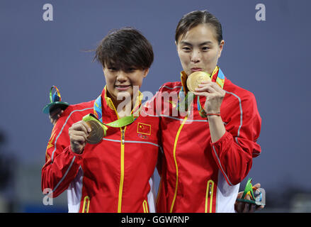 China's Shi Tingmao and Wu Minxia take gold in the Women's 3m Springboard final on the second day of the Rio Olympics Games, Brazil. Stock Photo