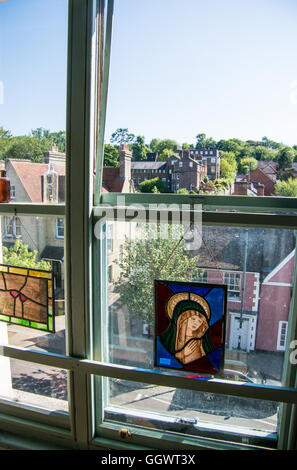 View of Berkhamsted High Street through upper floor windows of teahouse - Berkhamsted, borough of Dacorum, Hertfordshire, UK Stock Photo