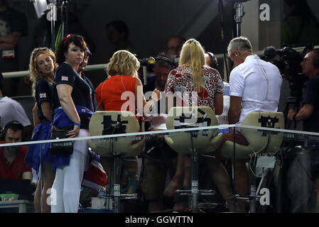 Mark and Caroline Peaty (left) with girlfriend Anna Zair in the BBC studio as they await the Men's 100m Final where their son will Adam will race for an Olympic medal on the second day of the Rio Olympics Games, Brazil. Stock Photo