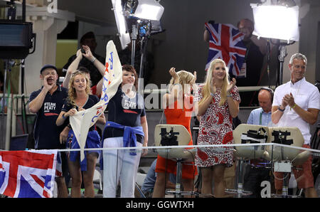 Mark and Caroline Peaty (left) with girlfriend Anna Zair in the BBC studio as they await the Men's 100m Final where their son will Adam will race for an Olympic medal on the second day of the Rio Olympics Games, Brazil. Stock Photo