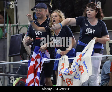 Mark and Caroline Peaty (left) with girlfriend Anna Zair in the BBC studio as they await the Men's 100m Final where their son will Adam will race for an Olympic medal on the second day of the Rio Olympics Games, Brazil. Stock Photo