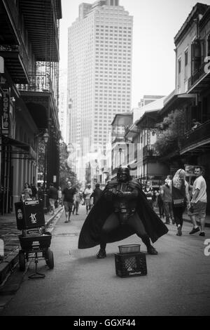 Darth Vader street artist dancing in New Orleans. French Quarter (Royal Street). 2016. Black and white. Stock Photo