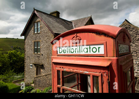 UK, England, Derbyshire, Litton, Cressbrook, Bottomhill Road, village phone box converted to defibrillator station Stock Photo