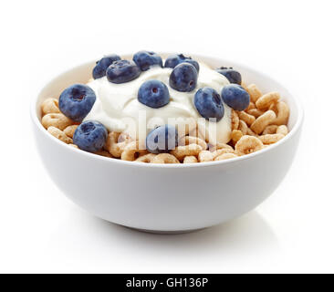 Bowl of Whole Grain Cheerios Cereal with blueberries and yogurt isolated on white background Stock Photo