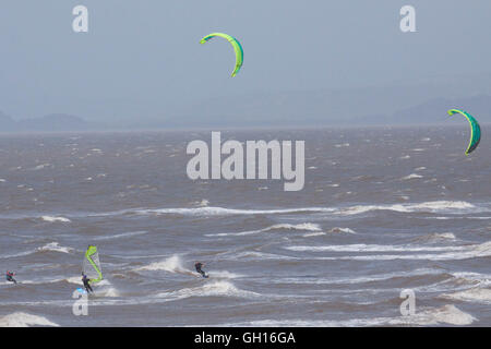 Morecambe Bay, Lancashire, UK. 7th August, 2016. Wind Surfer taking advantage of the strong wind blowing across Morecambe Bay Credit:  David Billinge/Alamy Live News Stock Photo