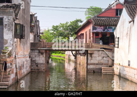 A bridge crossing over one of the water canals within Fengjing Town in Shanghai China. Stock Photo