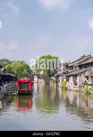 The buildings and water canals of Fengjing Town in Shanghai China on a sunny blue sky day. Stock Photo