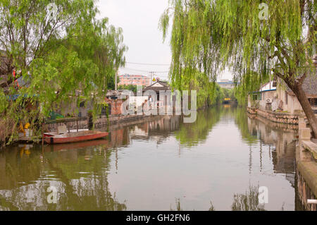 The buildings and water canals of Fengjing Town in Shanghai China on an overcast day. Stock Photo