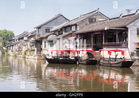 The buildings and water canals of Fengjing Town in Shanghai China on an overcast day. Stock Photo