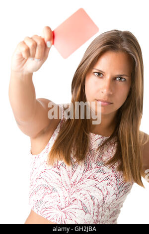 Woman showing a red card. Concept of relationship problems. Isolated in white. Stock Photo