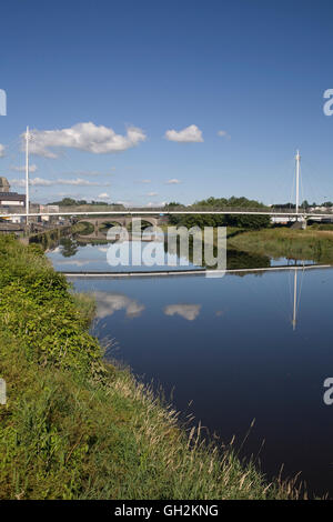 The calm waters of the River Towy at Carmarthen on a warm summer afternoon Stock Photo
