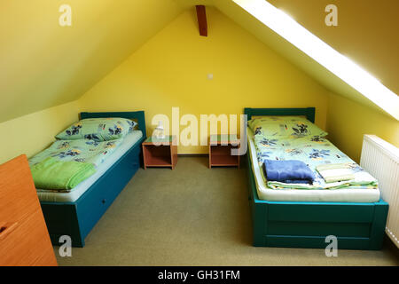 Lubica, PRESOV, SLOVAKIA - JULY 07, 2016: The interior of room with two beds in slovakian house in Lubica village, Kezmarok, Hig Stock Photo