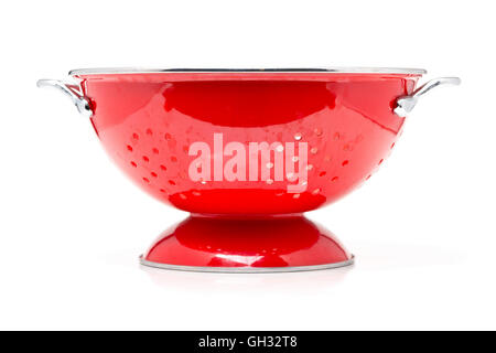 Empty red colander over white background Stock Photo
