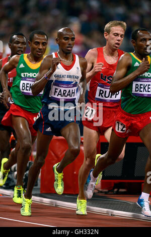 London 2012  - Olympics:   Athletics - Men's 10,000 Meter final.  Mohamed Farah of Great Britain winning the gold medal. Stock Photo