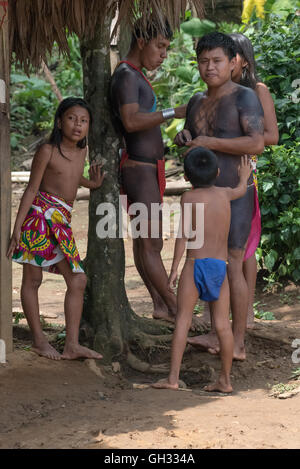 Embera children lives in the Panama rain forest and maintain her traditions and lifestyle Stock Photo