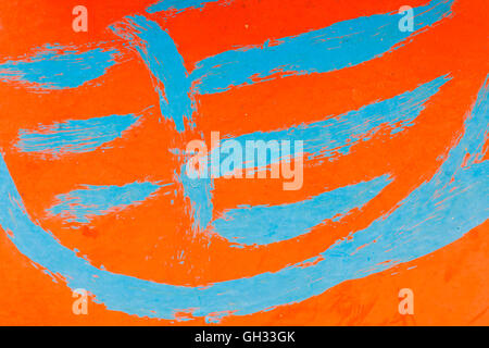 The blue paint on the red metal. Stock Photo